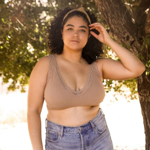 A stylish and supportive plus size bralette designed with lace trim details and padding for extra lift.
