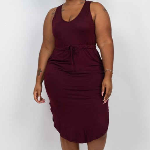 This Plus Size Drawstring Sleeveless Midi Dress is constructed of lightweight, high-stretch jersey fabric that provides both softness and ease of mobility. The side pockets facilitate a relaxed fit, making it ideal for everyday.