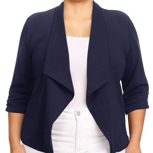 Our Plus Size Solid Waist Length Blazer featuring a relaxed fit and open front, designed in a waist-length style, complete with a draped neckline and rolled-up sleeves with ruched detailing.