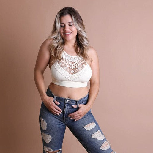This Plus Size Crochet Lace High Neck Bralette is a must have! The high neck bralette will allow you to feel trendy, while being comfortable and supportive at the same time.