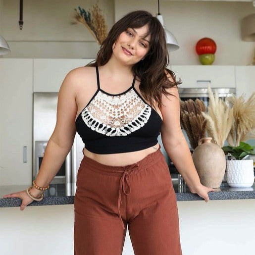 This Plus Size Crochet Lace High Neck Bralette is a must have! The high neck bralette will allow you to feel trendy, while being comfortable and supportive at the same time.
