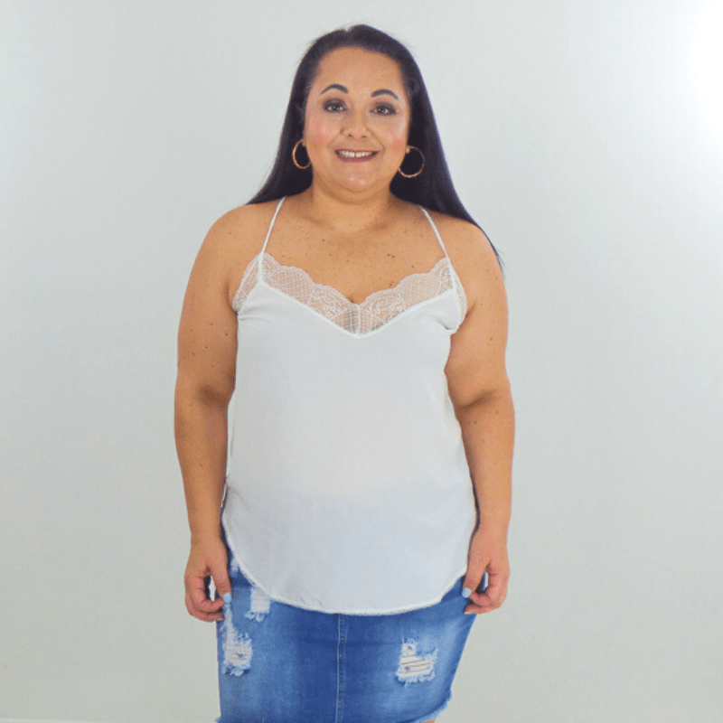 This classic lace cami tank is so chic. It features a woven fabric with a v-neck neckline on the front with lace detailing, and adjustable straps. The perfect layering piece