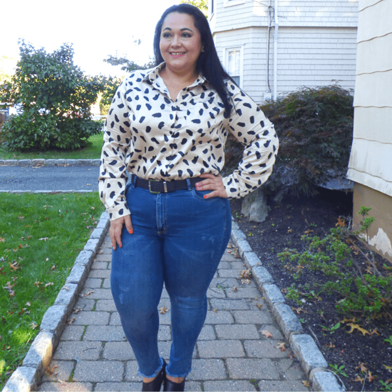 This Silky Animal Print Plus Size Button Down Top featuring a lightweight material, button down front with a collared neckline and long loose sleeves.