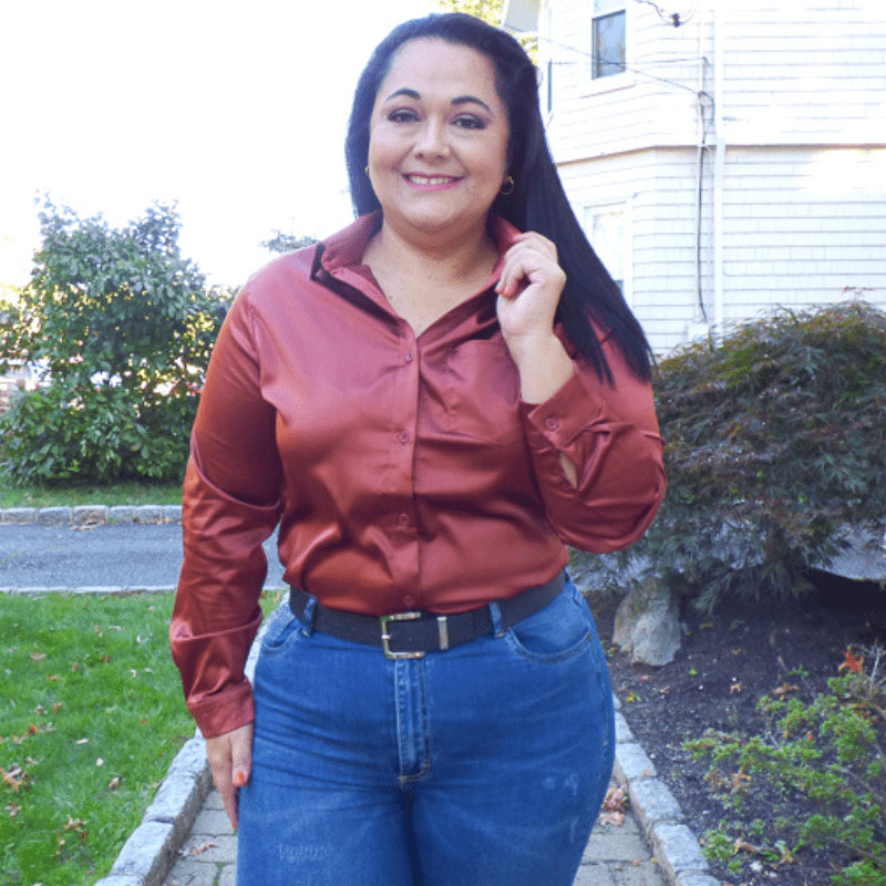 This Button Down Plus Size Top is a closet essential featuring lightweight material, a button down front with a collared neckline, long loose sleeves, an accent chest pocket.