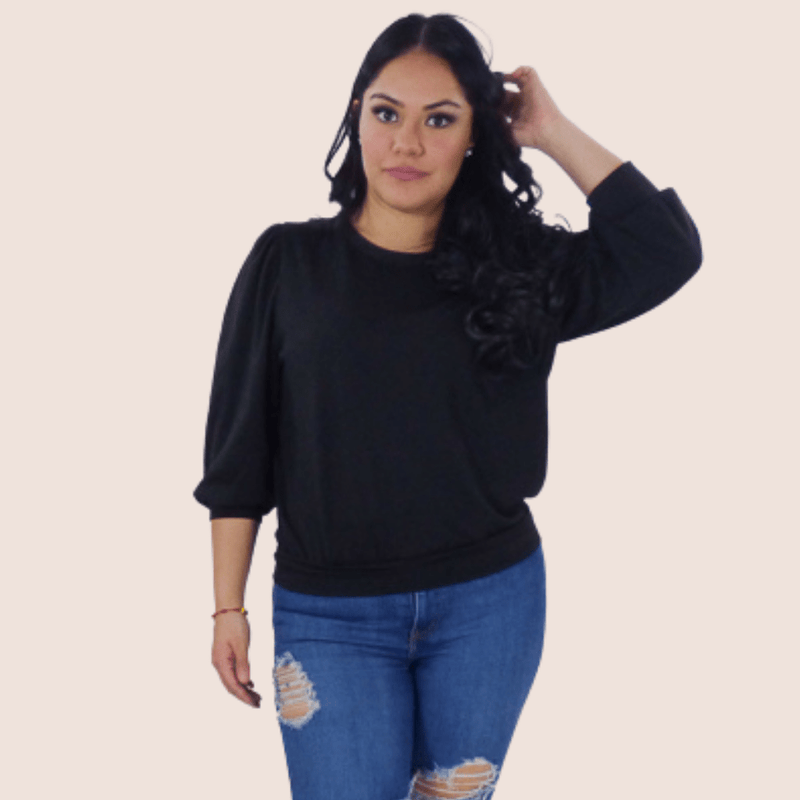 Our Balloon Long Sleeve Sweater is a fun and lightweight knit that's flattering on everyone. Relaxed Not too fitted, sits on the hips. Ideal for layering or wearing on its own. 