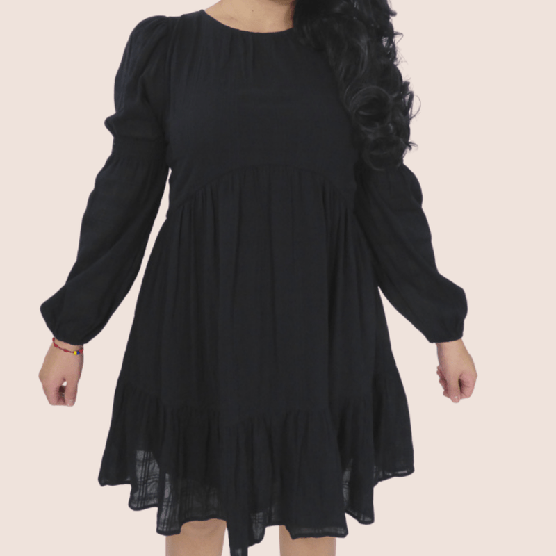 This Balloon Sleeve Baby Doll Dress is a relaxing fit, with a gathered waist and balloon sleeves.It is fully lined and has hidden pockets to hold your essentials.