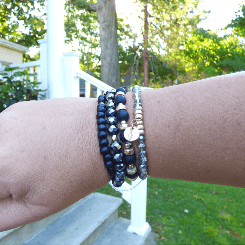 This bracelet set features a natural stone, wood, and crystal stretch bracelet set that is perfect for everyday wear. This bracelet can be worn on its own, or stacked with other bracelets.