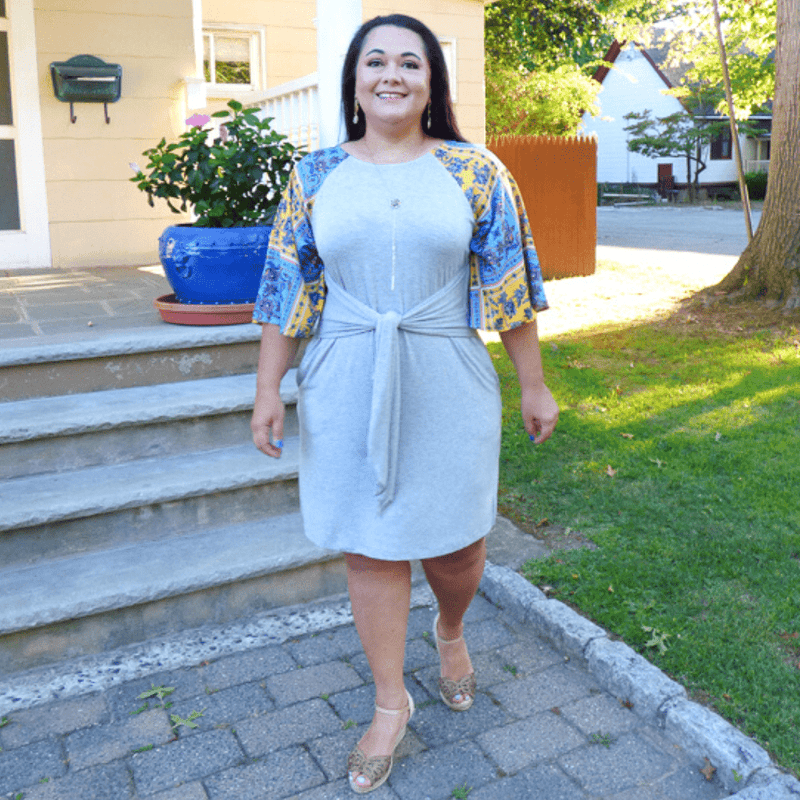 A boho style dress perfect for a casual event. This Plus Size Dress features a paisley print, pockets and a straight hemline.