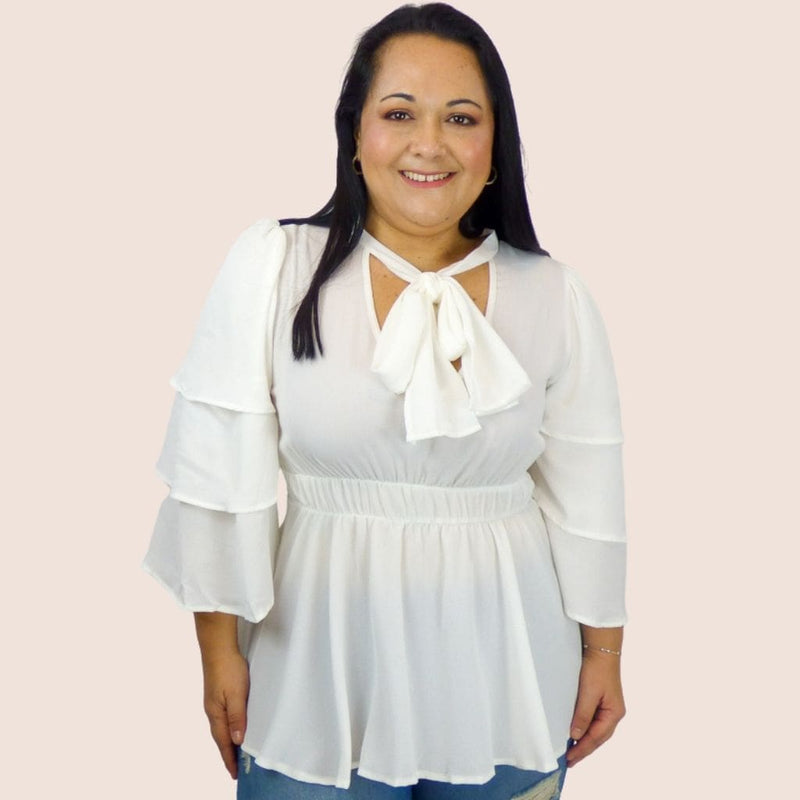 Bow Tie Peplum Plus Size Top with 3/4 Bell Sleeves. This fit and flair top has elastic on the waist, perfect for women that want to show off their sexy curves while staying comfortable.