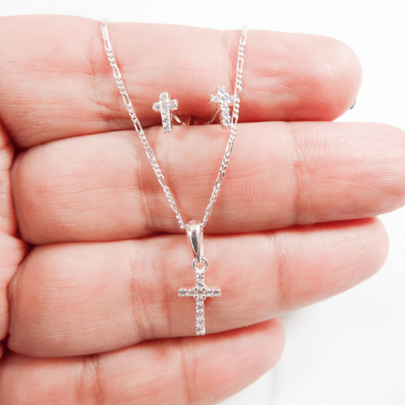 This two-piece jewelry set is the perfect way to show your faith and style. The chain necklace features a gorgeous cross and the simple earrings feature white cubic zirconia stones.