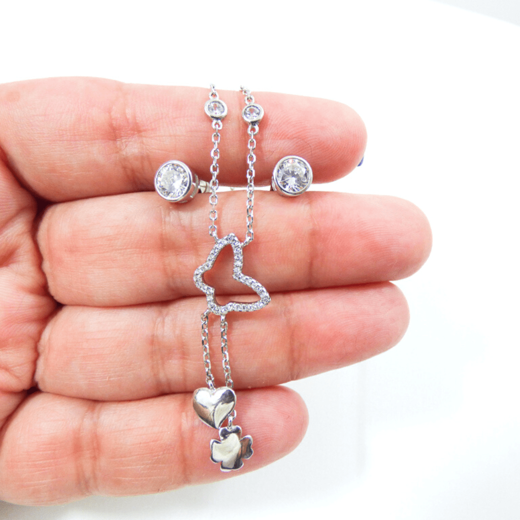 Our gorgeous two-piece butterfly and shamrock sterling silver jewelry set is sure to be your favorite go-to look. The stud earrings are a white cubic zirconia and the pendant is a sparkling butterfly accented with a shamrock and a cubic zirconia stone.
