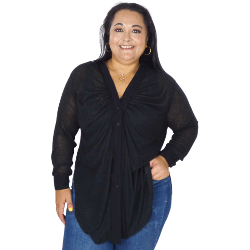 The Solid Button Down Ruched Plus Size Shirt will soon become your favorite go-to shirt. It's a loose fit and lands below the hips, giving you room to move.