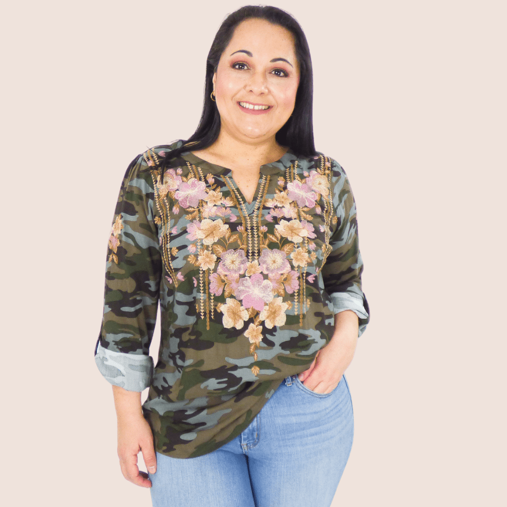 This blouse is a great alternative to solid tops, and it's incredibly versatile — wear it tucked in or out; pair it with dark or light bottoms.