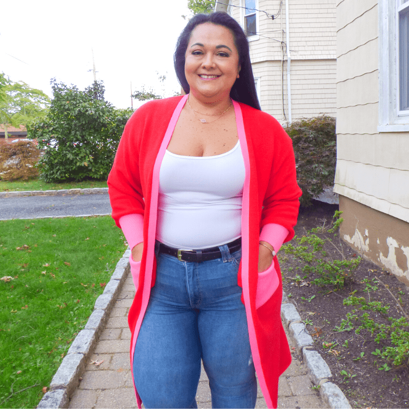 Cozy up for fall in this stunning red and pink Color Block Cardigan featuring soft lightweight material, long sleeves with cuffs, trim detailing and accent side pockets
