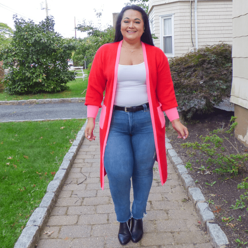 Cozy up for fall in this stunning red and pink Color Block Cardigan featuring soft lightweight material, long sleeves with cuffs, trim detailing and accent side pockets