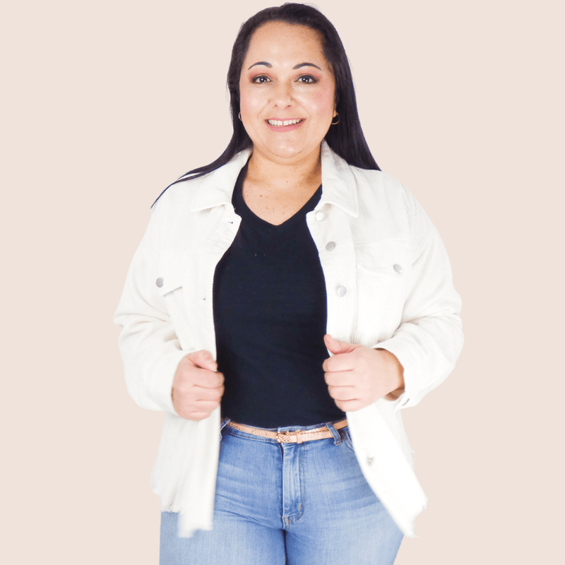 This Corduroy Jacket features drop shoulders, front pocket details, and the raw edge hemline details on the bodice. This is a great layering piece!