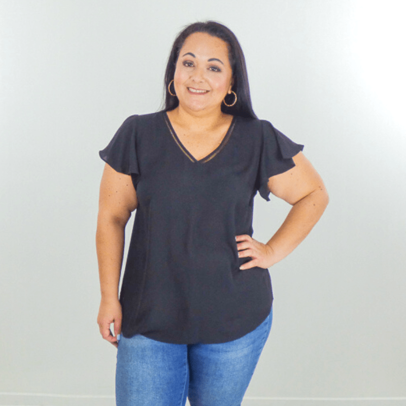 Look chic while staying comfortable in our plus-size lace v-neck woven top. Wear it by itself, or layer it under a jacket. Featuring a ruffle sleeve and round hem.