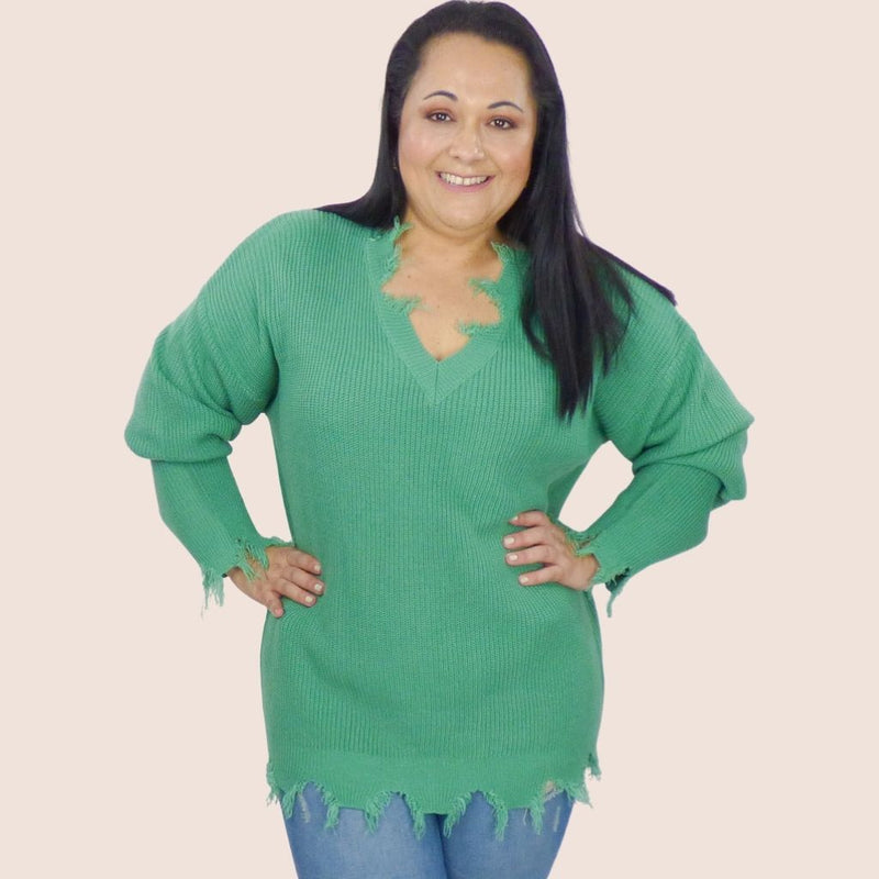 Our Plus Size Distressed Sweater is light and easy to wear. The distrssed detail on the neckline, wrist and hem add an edgines to your look. 