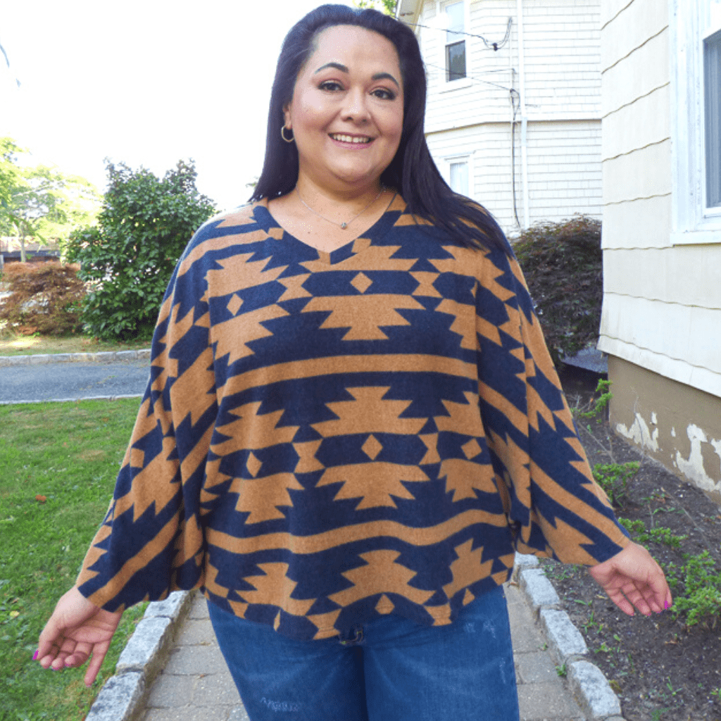 A cozy, ultra-soft dolma sleeve plus size poncho is a wardrobe essential for any season. The soft fabrics perfect for the cold winter months.