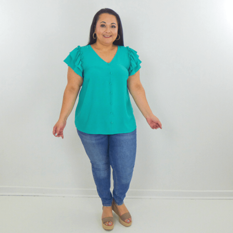 The Plus Size Double Ruffles Sleeves Top is full of femininity and fun. This V-necked top has ruffle sleeves that make it stand out from the crowd.