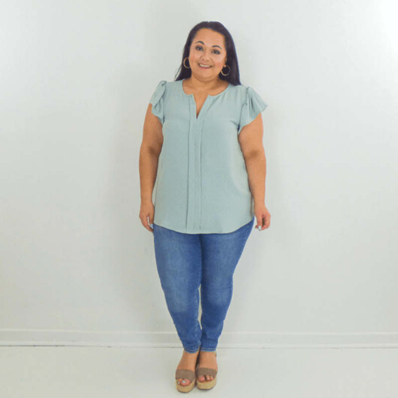A perfectly relaxed fitted short-sleeve plus size top with a split v-neckline. The ruffle sleeves are a fun twist. Perfect for spring and summer.