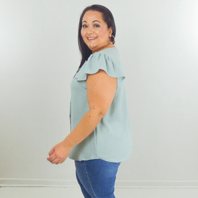 A perfectly relaxed fitted short-sleeve plus size top with a split v-neckline. The ruffle sleeves are a fun twist. Perfect for spring and summer.