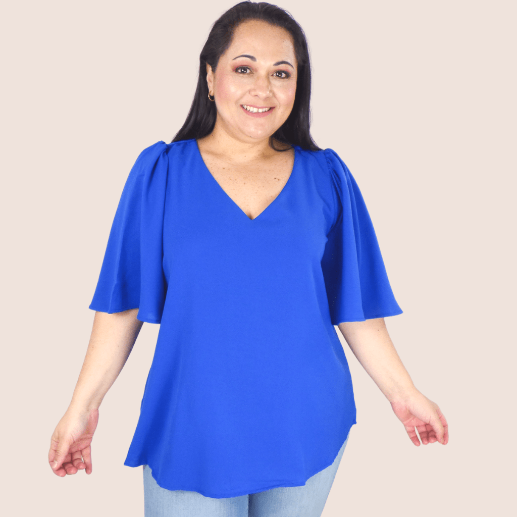 The Flared Half Sleeve Top is a must have basic to mix and match with your wardrobe! We love this for everyday wear and it is a great layering piece. 