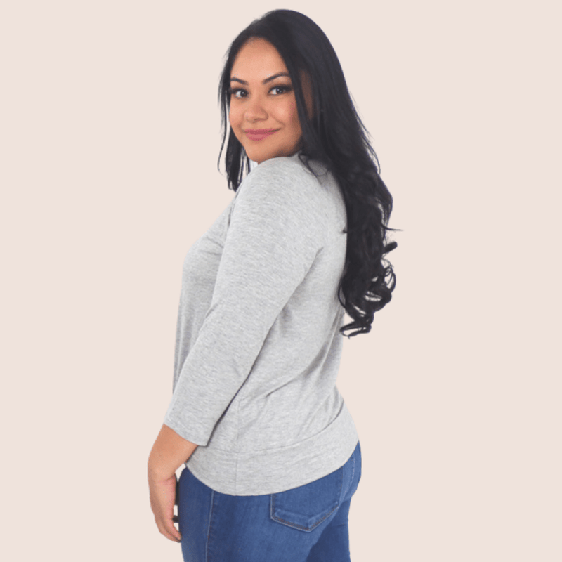 Our Front Knot Log Sleeve Top is the perfect transition piece. This shirt features a loose-fitting front knot and 3/4 sleeves for a comfortable, flattering look.