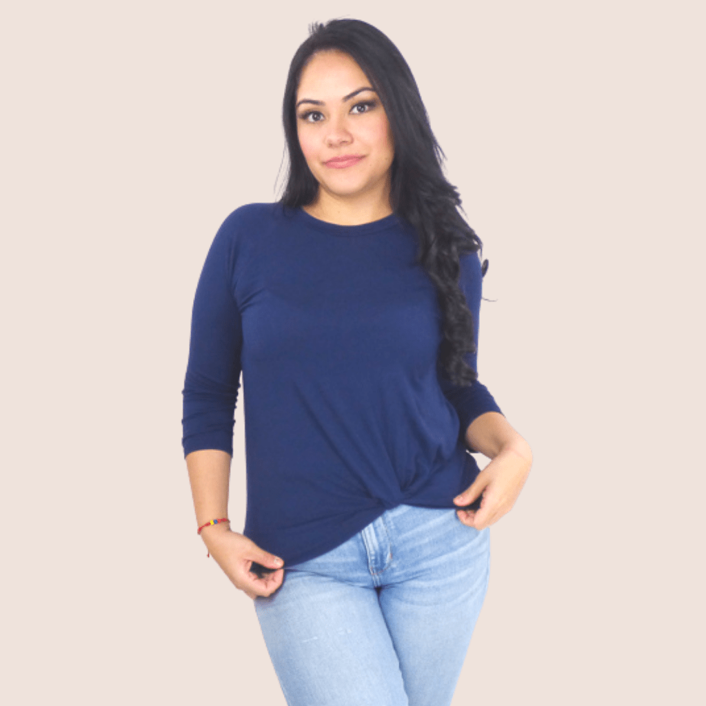 Our Front Knot Log Sleeve Top is the perfect transition piece. This shirt features a loose-fitting front knot and 3/4 sleeves for a comfortable, flattering look. 