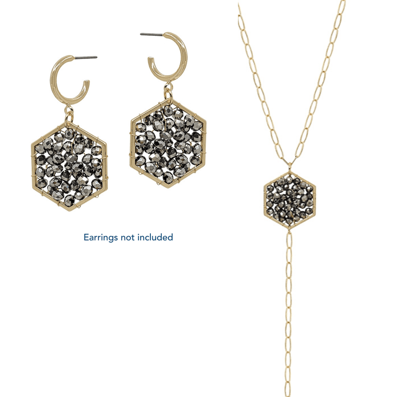 Style your outfit with our Crystal Hexagon 1.5" Drop Earring. Each earring has black colored crystals that add extra glamour and sparkle!.