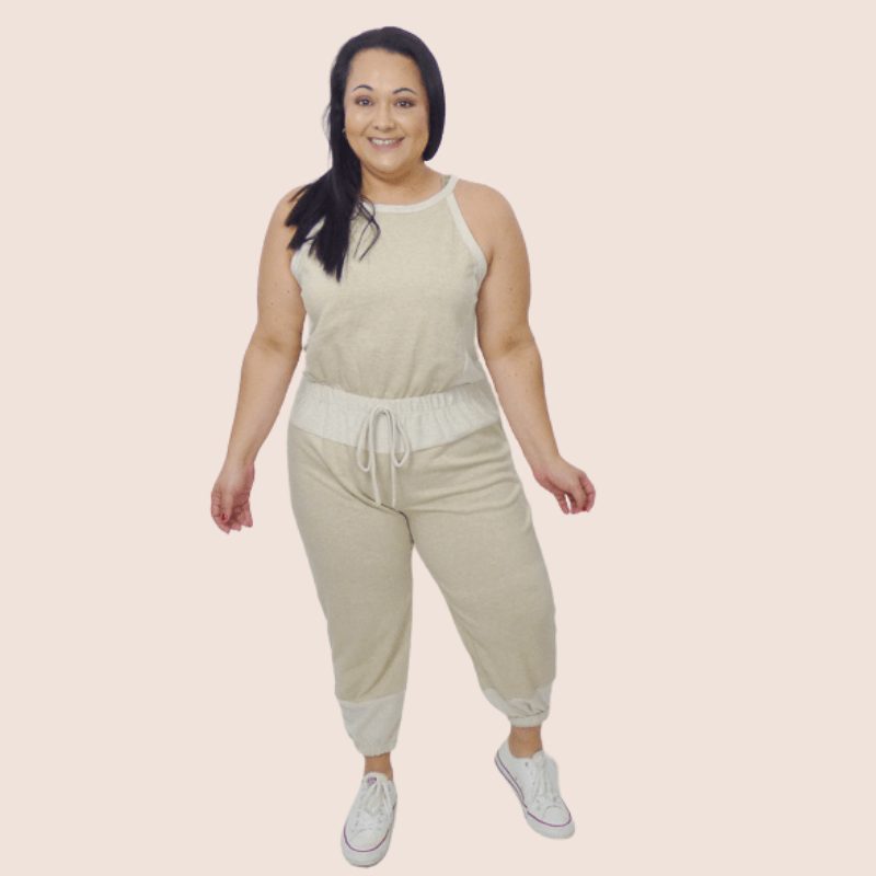 Our Halter Neck Drawstring Plus Size Jumpsuit features contrast cotton details and a tapered leg. Pair the jumpsuit with your favorite sneakers for an easy weekend look.