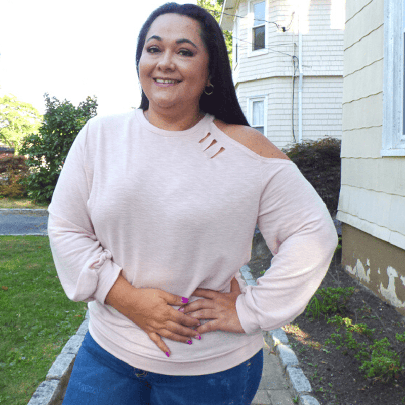This Laser Cut Cold Shoulder Plus Size Top. This Top features cold shoulder and laser cut outs and shows just the right amount of skin.