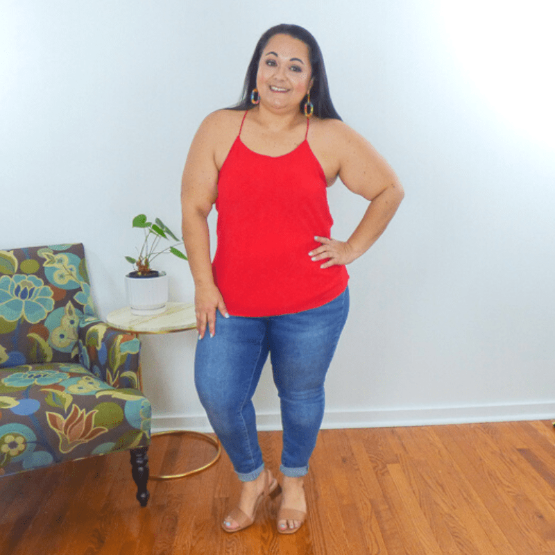 This classic razorback cami tank is so chic. It features a super woven fabric with a round neck style, shell lining, & spaghetti razorback straps. The perfect layering piece