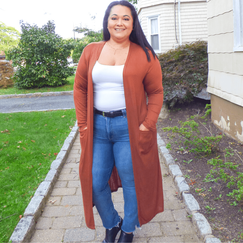 Take on any day with this Long Pocket Cardigan featuring soft lightweight material, long sleeves, front pockets, and a draped open front silhouette.