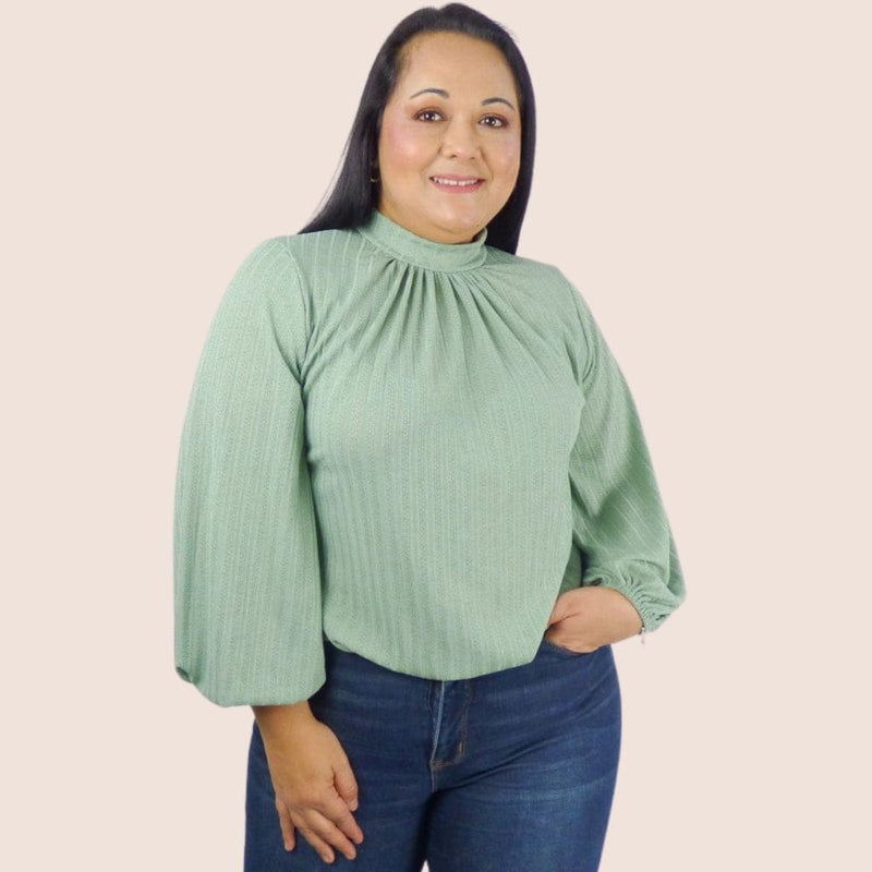 This fashionable Mesh Lace Plus Top is comfortable and airy. The mock neck and long sleeves will add elegance to this top. Pair it with jeans for a casual look.