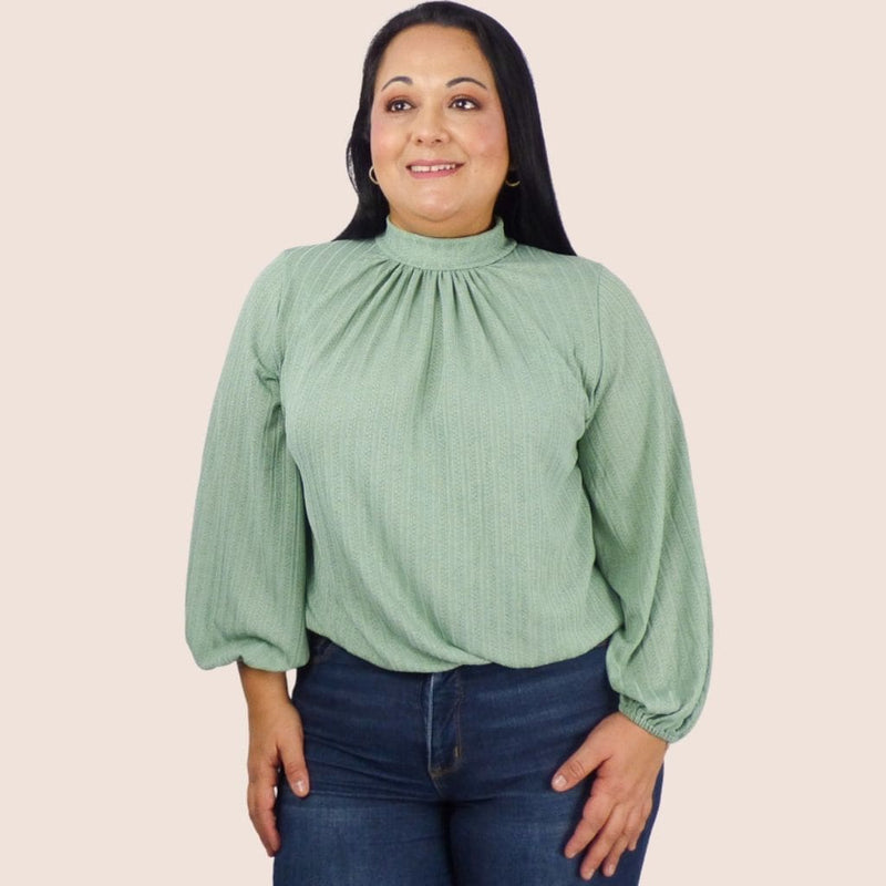 This fashionable Mesh Lace Plus Top is comfortable and airy. The mock neck and long sleeves will add elegance to this top. Pair it with jeans for a casual look.