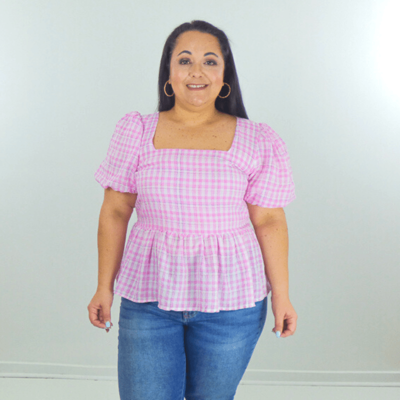 The Plus Size Puff Sleeve Gingham Top is a game changer to your wardrobe! It's a super simple baby doll silhouette, you'll be able to pair it with almost anything.