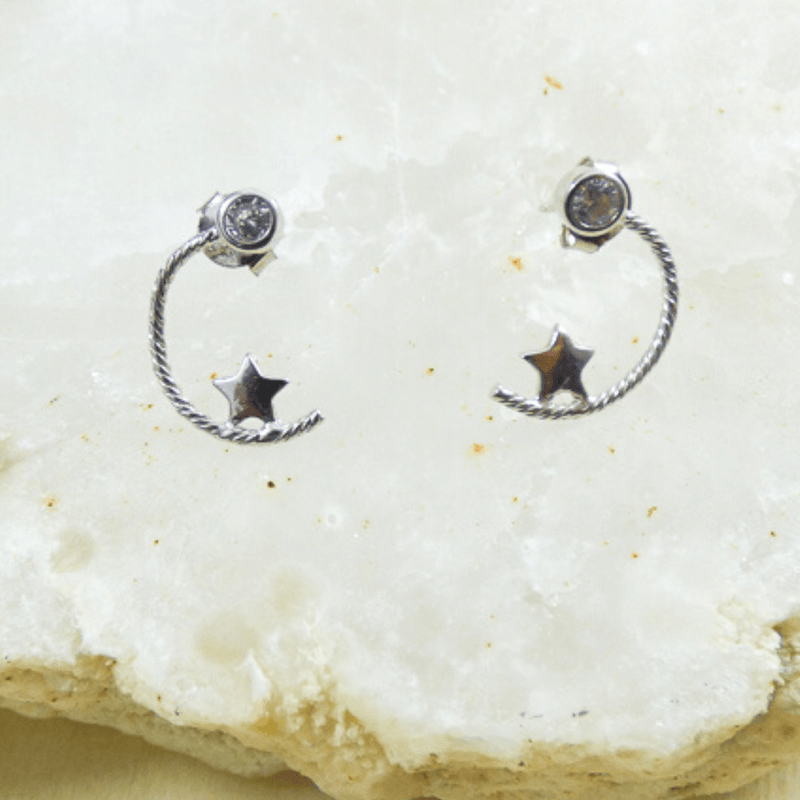 Enchanting and full of character, these earrings are crafted from 925 sterling silver. The sterling silver moon and star are set with a white cubic zirconia stone.Enchanting and full of character, these earrings are crafted from 925 sterling silver. The sterling silver moon and star are set with a white cubic zirconia stone.