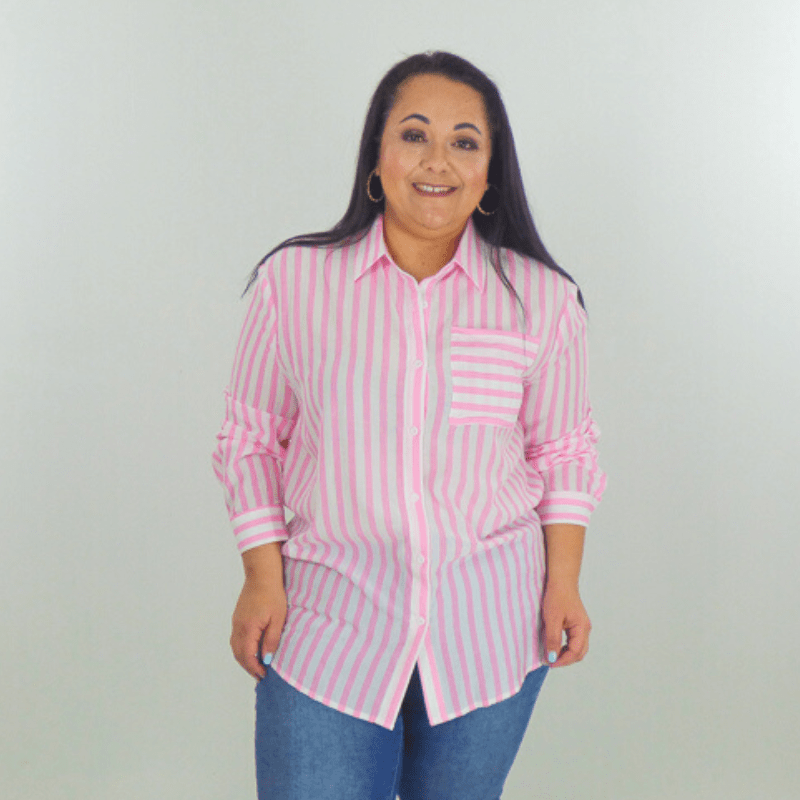 Look cute and casual in this lightweight striped button-up top. The Newport features a lightweight material, a pink striped pattern, functional buttons, a collared neckline, a chest pocket, and a high low round hemline.