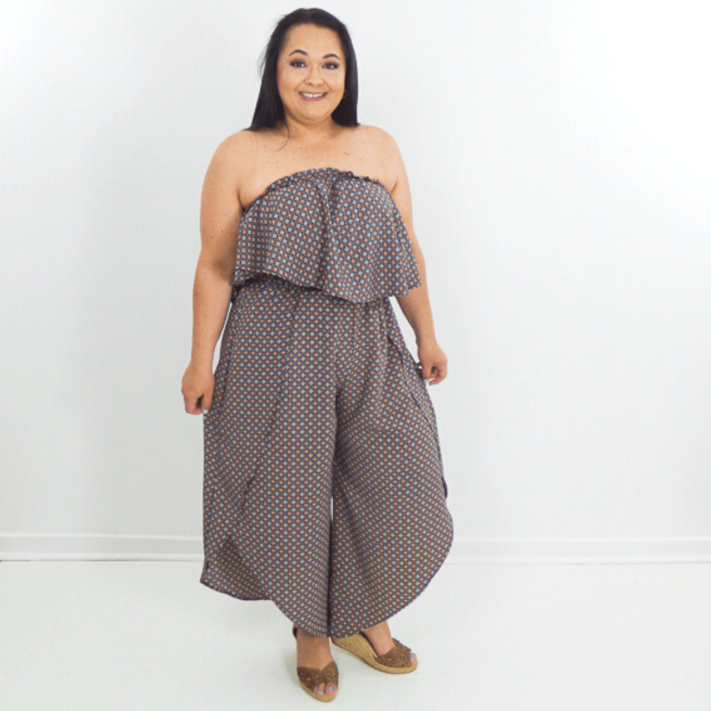 This effortless boho jumpsuit is perfect for any occasion. It's wide leg, off-shoulder cut, and relaxed fit are complemented by a bold and trendy print.