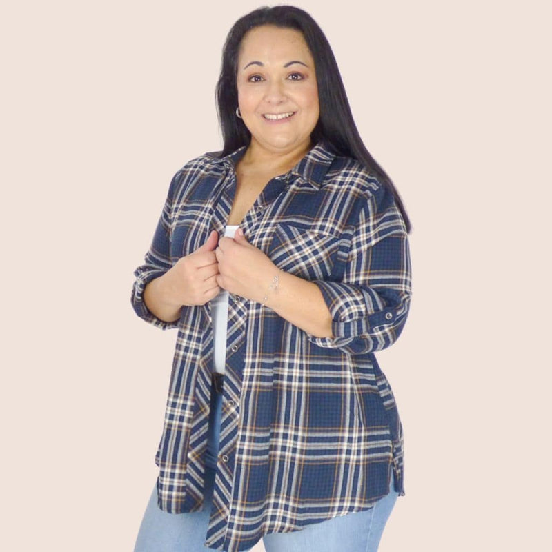 Classic preppy plus size plaid shirt. Includes roll up sleeves to add an edgy touch. Perfect for layering or wearing on its own.