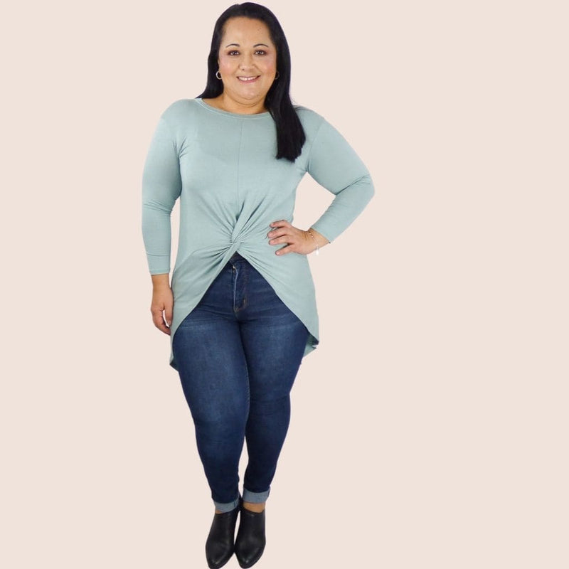Jersey High Low 3/4 Sleeve Plus Top offers a flattering fit. The high low hem offers a flattering fit and feel making it versatile for any casual event