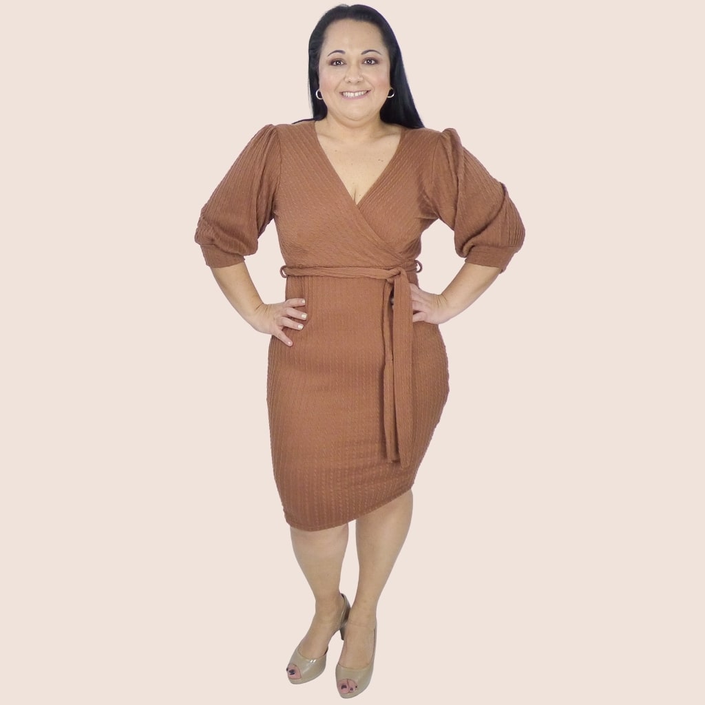 Our knit suplice plus-size midi dress is a classy look to show off your curves. The Long sleeves provide comfort and covering during the cooler months of the year.