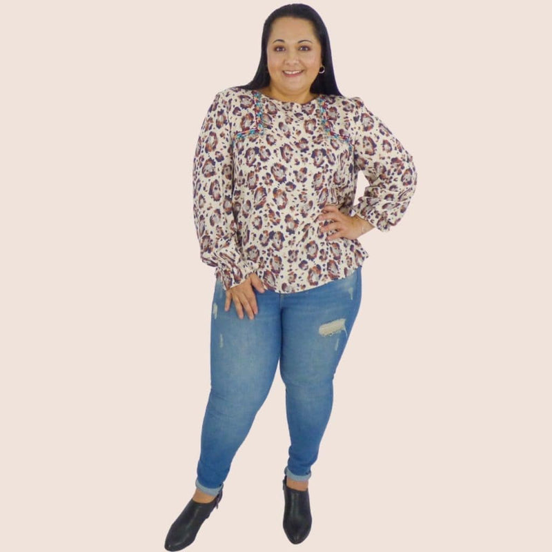 Relaxed fit long sleeve plus size blouse with beautiful embroidery detail. Bohemian Style inspired. Pair it with your favorite skinny jeans, trousers or denim skirt.