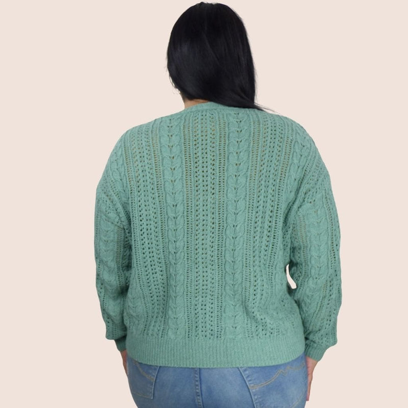 This loose-knit cardigan with seashell button-down detail will keep you warm and stylish all year round. Wear it over a tank top, long-sleeved tee, or on its own.