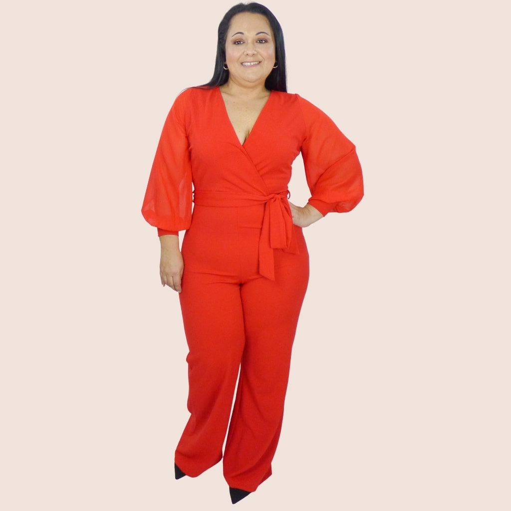 This Straight Leg Pants Jumpsuit has a surplice V neck, chiffon contrast, and knit banded sleeve. It also features a self-tie waist to show off those curves