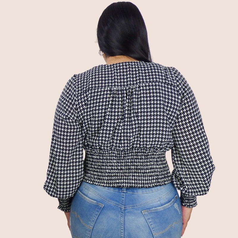 Plus-size Houndstooth print surplice smocked waist long sleeves top.