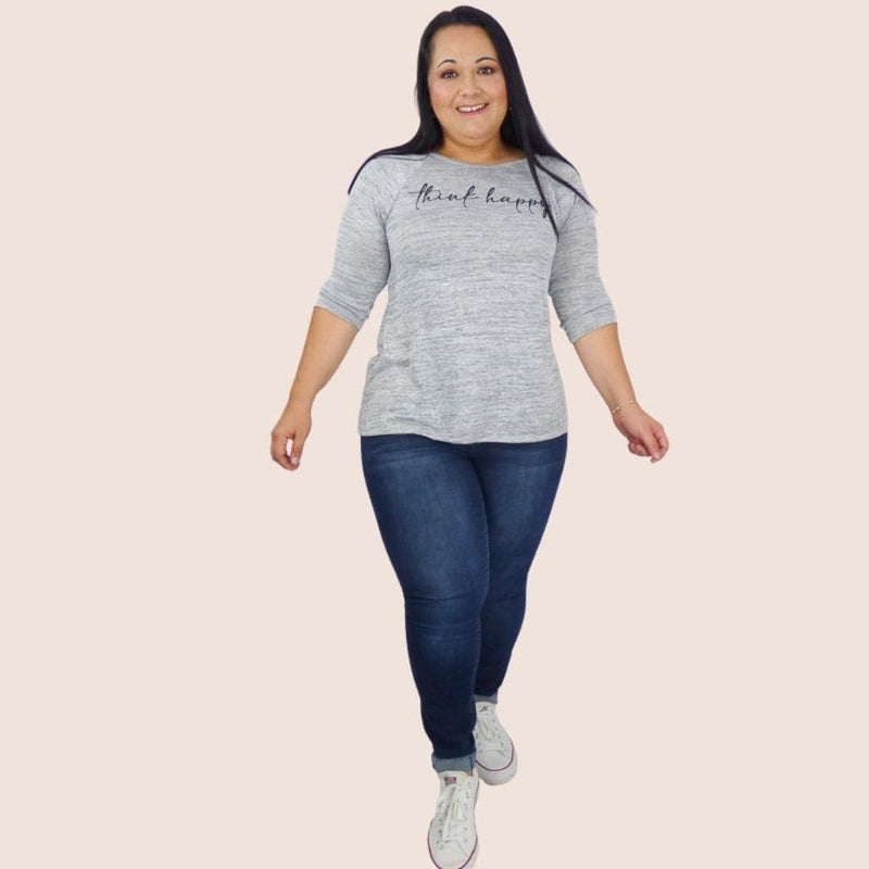 Our "Think Happy" Round Neck Grey Plus Top will keep you cozy and stylish all season long. The fit and flare design cut will enhance the curve of your waist.
