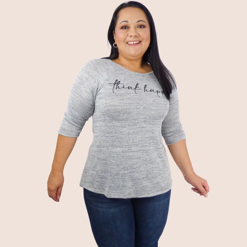 Our "Think Happy" Round Neck Grey Plus Top will keep you cozy and stylish all season long. The fit and flare design cut will enhance the curve of your waist.