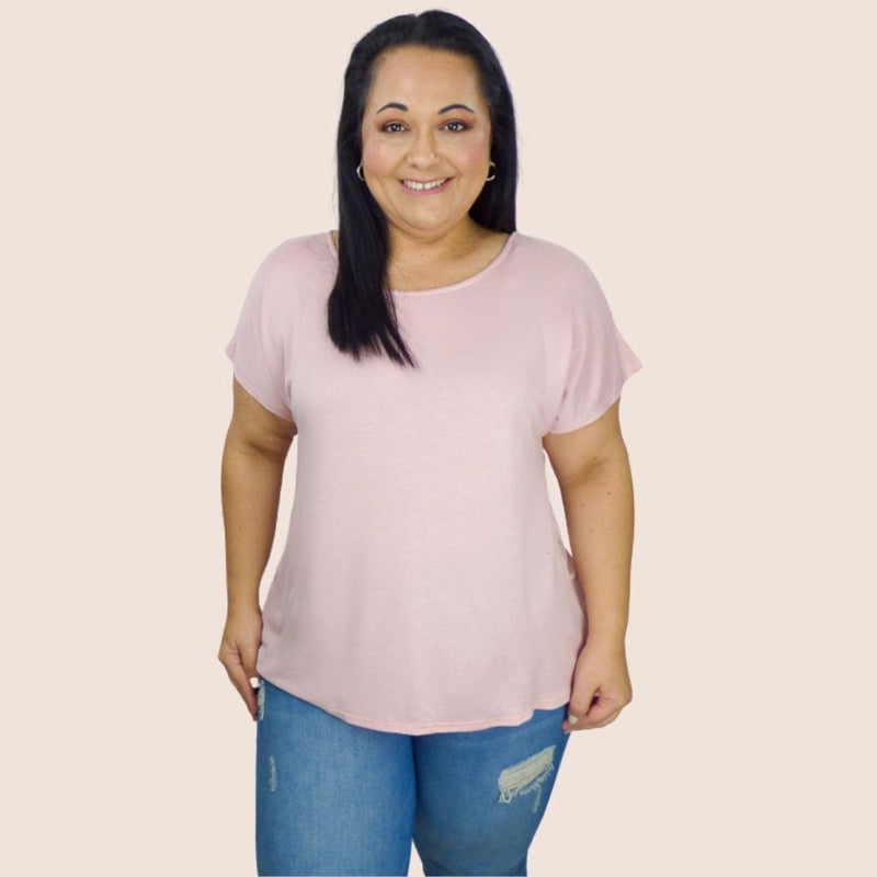 This easy-wear top is super comfortable. The round-neck dolman sleeves and twist back offer a flattering fit. The open back adds a simple touch of style. 